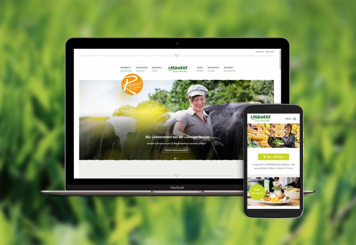 Laptop und Smartphone mit Bio-Website