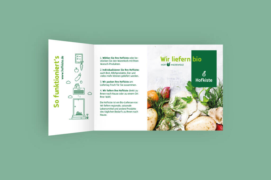 Werbeflyer der Hofkiste mit Bio-Lebensmitteln und Bestellinformationen